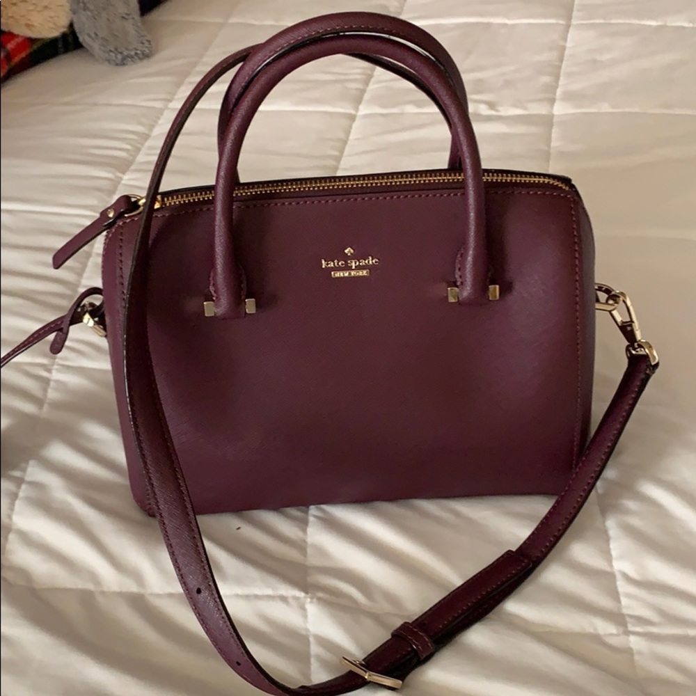 Kate spade mini tote 9 inches wide and 8 in height